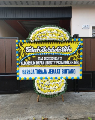 Papan Bunga Duka di Pujidadi
